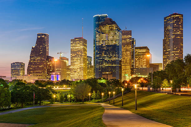 Downtown Houston skyline from Buffalo Bayou Park representing local taxi service coverage